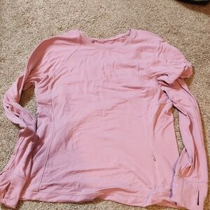 Lululemon Light Pink Long Sleeve Tee w/ hand/thumb holes/covers & zipper pockets